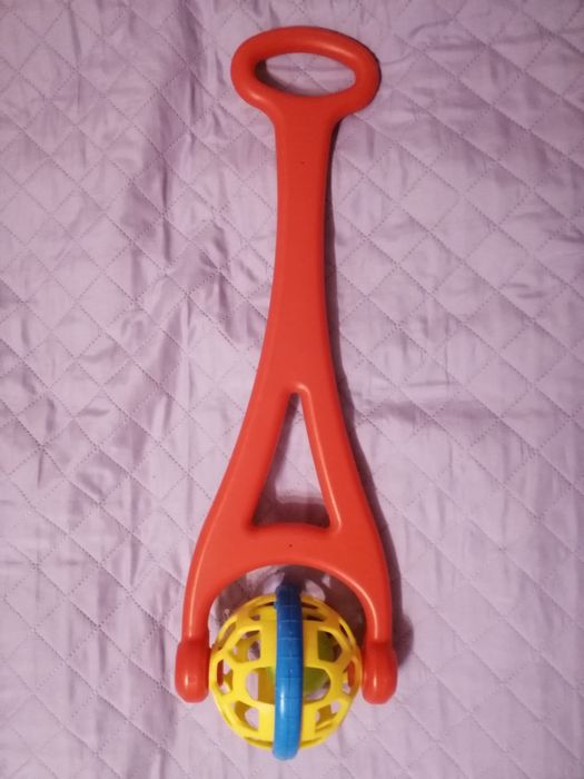 Каталка-брязкальце для малюків