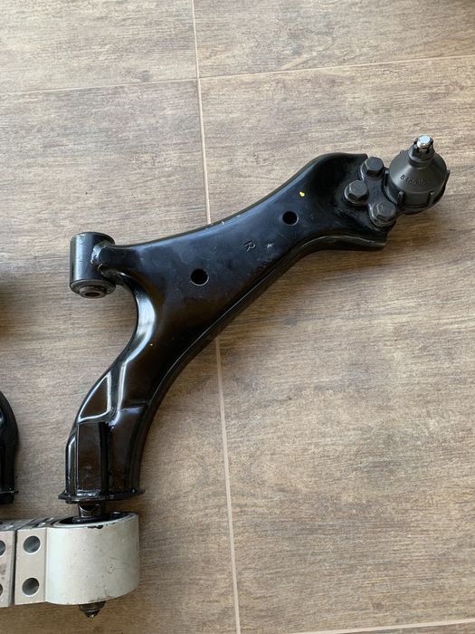 Передні ричагі Chevrolet, Opel, Ford комплект