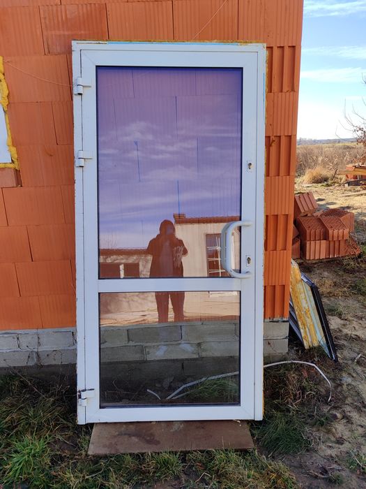 Drzwi wewnętrzne aluminiowe 110x220 z szybą białe