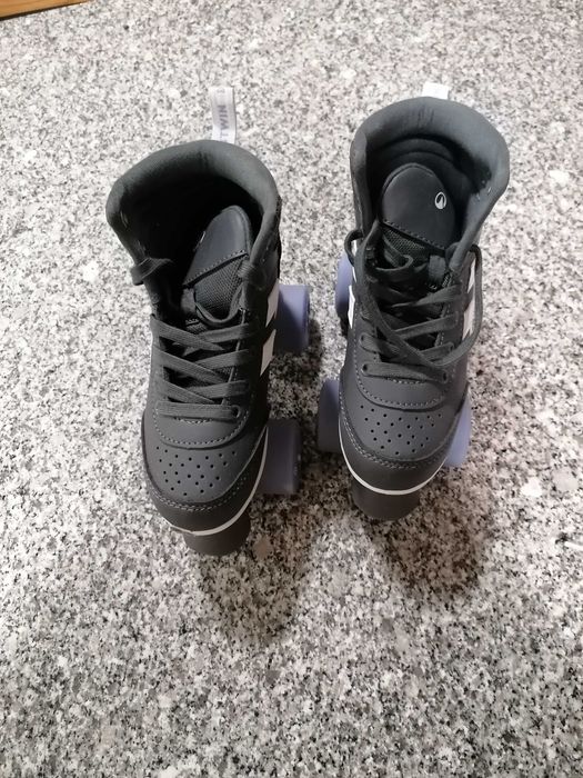 Patins 4 rodas e travões semi novos ( talao de compra de 18/12/25)