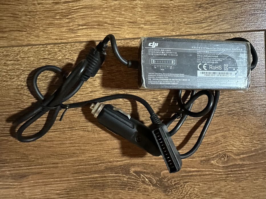 Продам новую оригинальное автомобильное зарядное на DJI Mavic Pro.