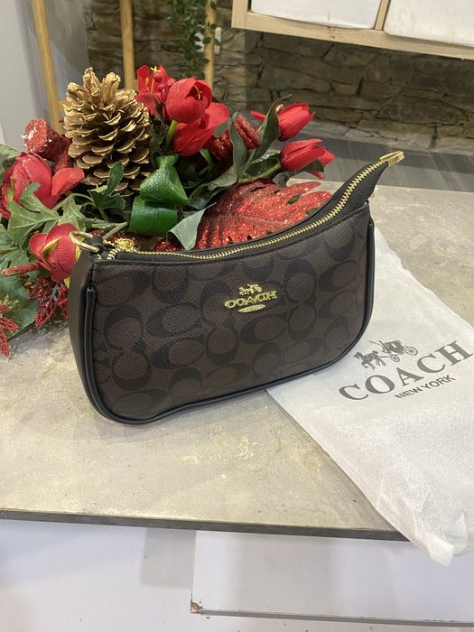 Mala senhora  coach nova muito elegante e muito bom acabamento