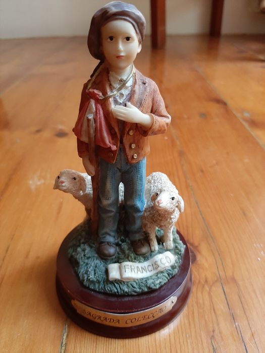 Estatueta Francisco em marfinite pintado à mão