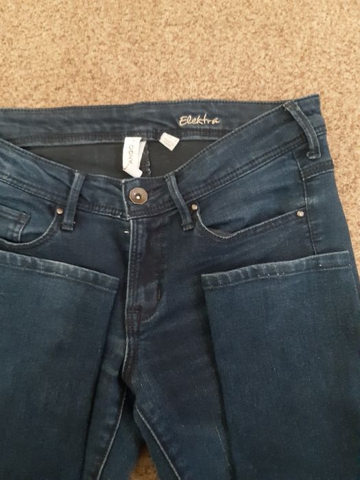 Jeansy damskie Mango