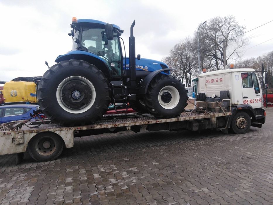 Евакуатор. Послуги евакуатора для перевезення вантажів . Лавета