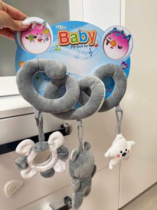 Іграшка на коляску, ліжко