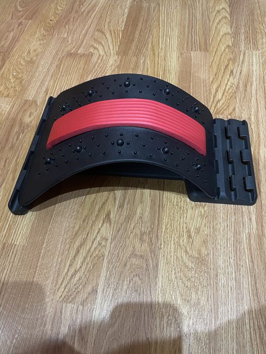 Масажер для спини