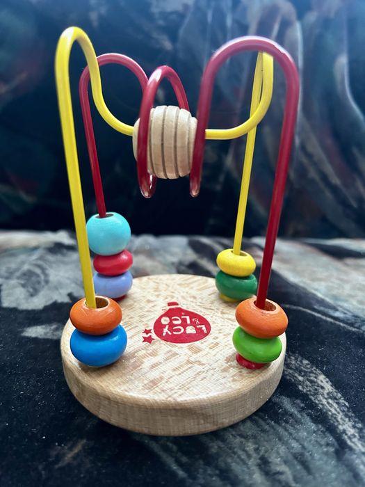 Інтерактивна деревяна іграшка