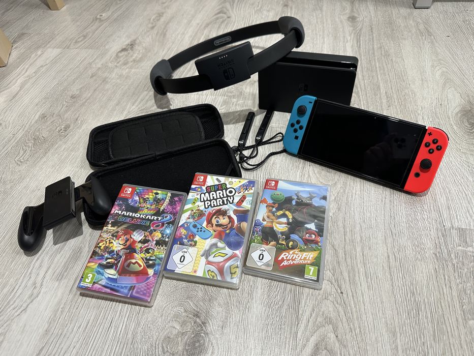 Nintendo Switch OLED + gry + Ring Fit Adventure + etui