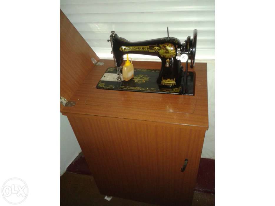 Máquina de costura singer