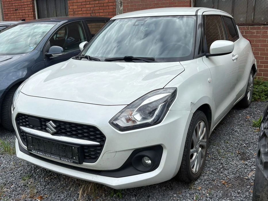 Suzuki Swift biała perła lekko uszkodzony