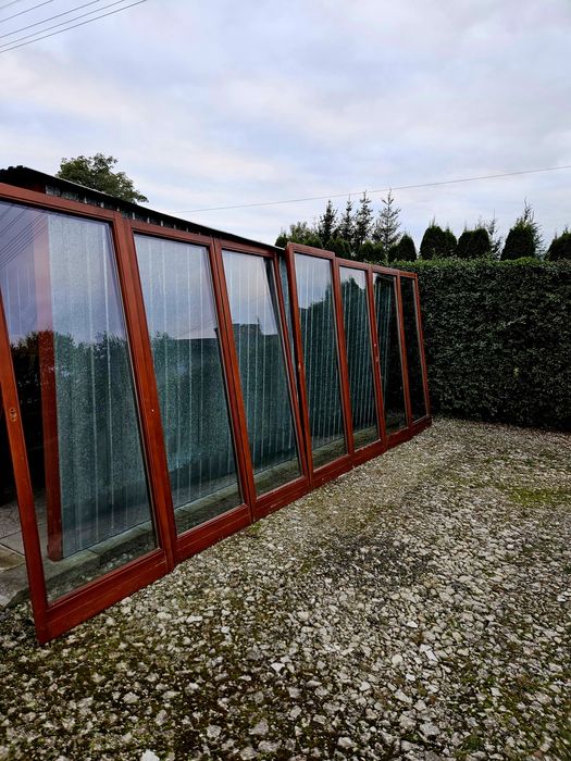 Okna drewniane szyby zespolone dwuszybowe taras ogród zimowy