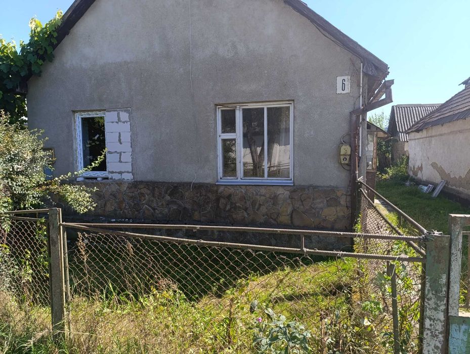 Ділянка з будинком