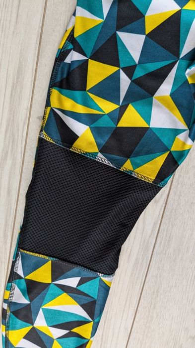 Wielokolorowe leginsy z kieszonką na zamek Crivit S 36