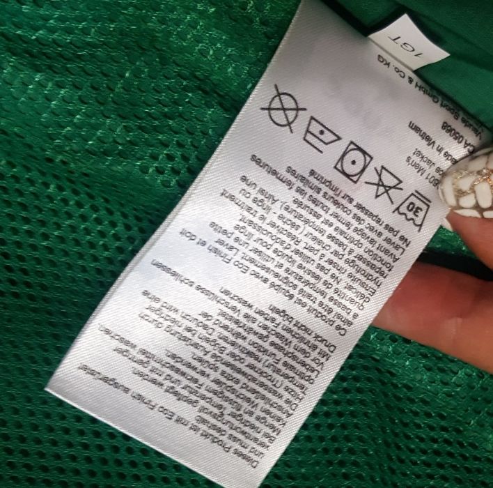 Оригинал.фирменная,легкая,функциональная ветровка-дождевик vaude green