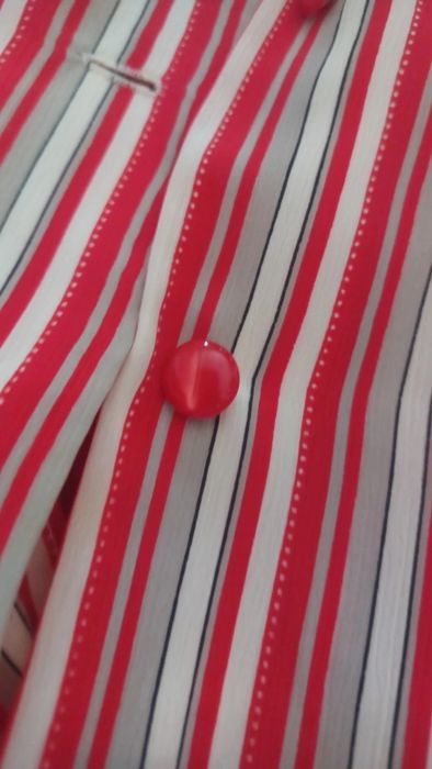 Camisa manga curta às riscas