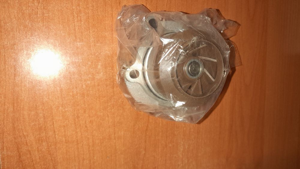 Новий ГРМ INAта помпа DOLZ