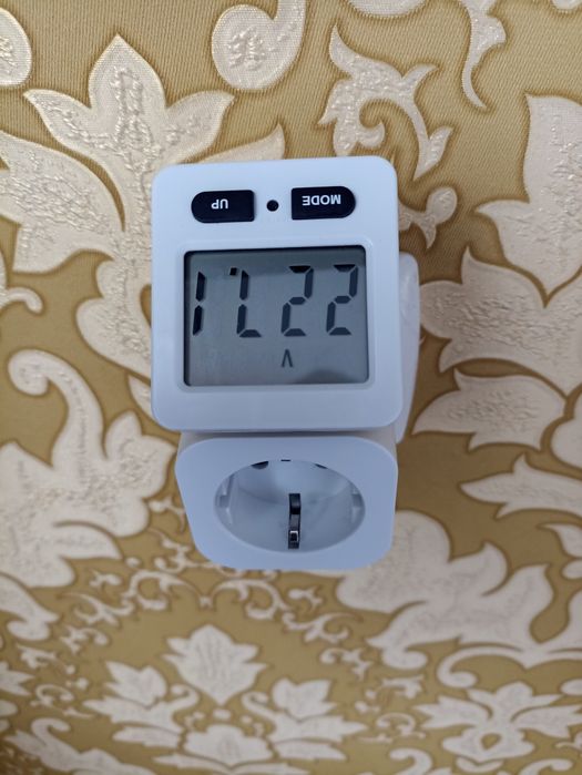 Електричний  адаптер  перехідник