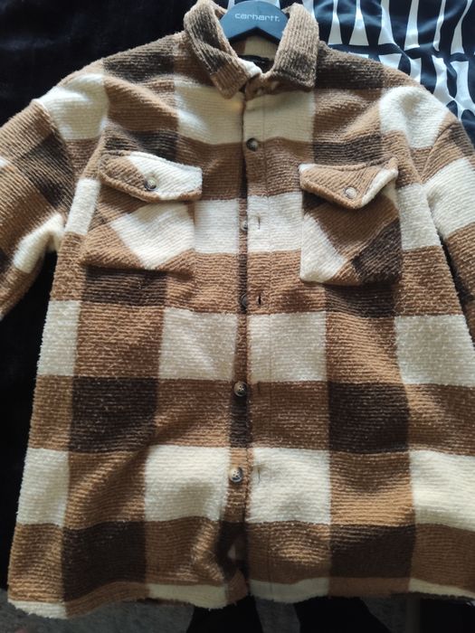 Casaco castanho quadrados