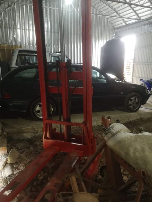 Torre porta palotes para trator