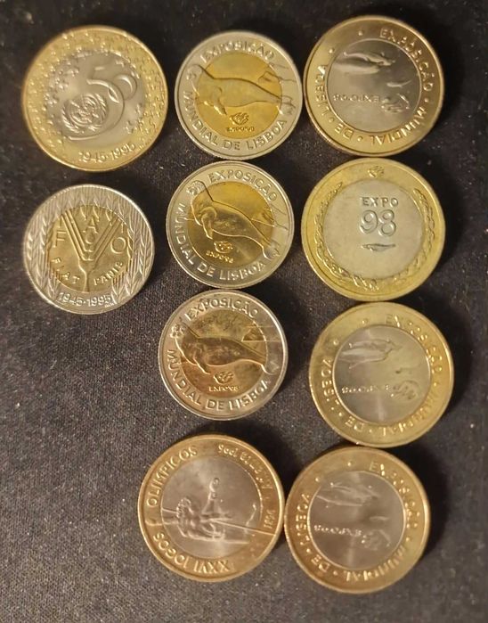Lote de 11 moedas comemorativas portuguesas em escudos, a maioria em estado não circulado ou quase (BNC).