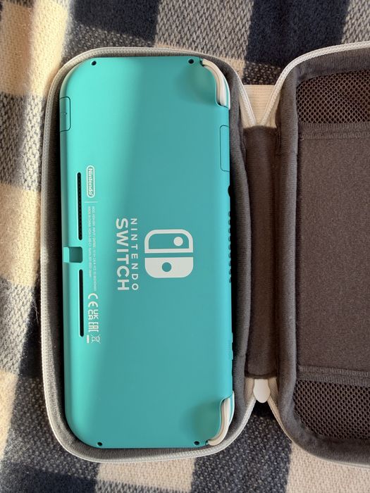 Nintendi switch lite torquesa