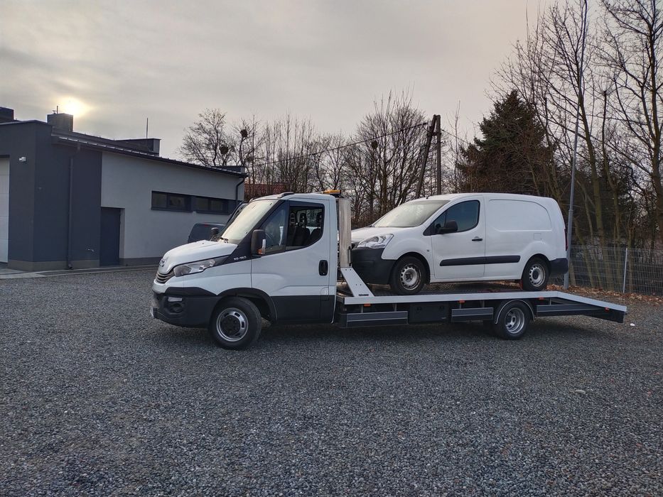 Pomoc drogowa- transport maszyn laweta, holowanie