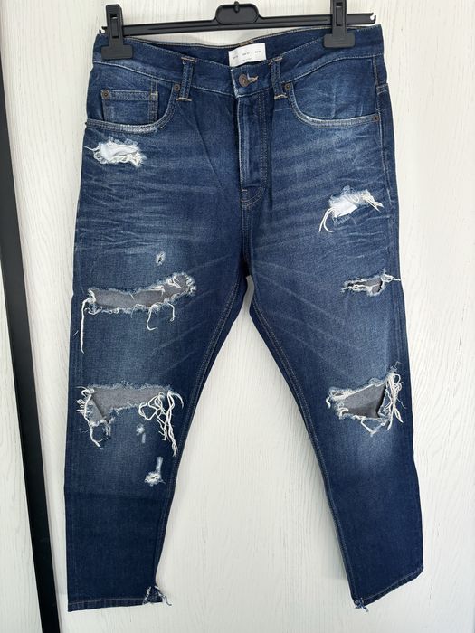 Spodnie jeansy z przecieraniem uniwersalne zmdc