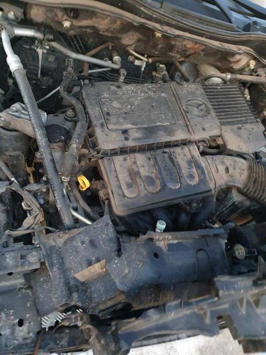 Mazda II 1.3 benzyna 16V 55kW, 5 drzwi kolor czarny, hak,  na części