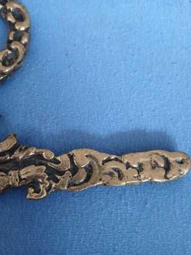 Stare mosiezne zakonczenie do lampy zegara