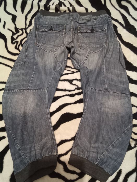 Spodnie joggery męskie River Island