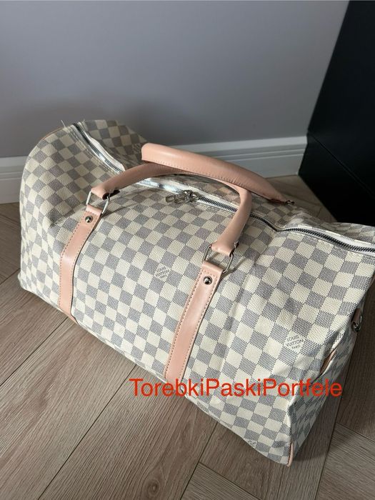 Nowa torba podróżna Louis Vuitton.