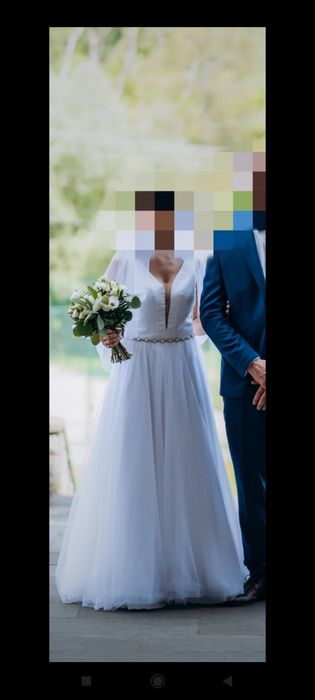 Suknia ślubna prosta z dekoltem