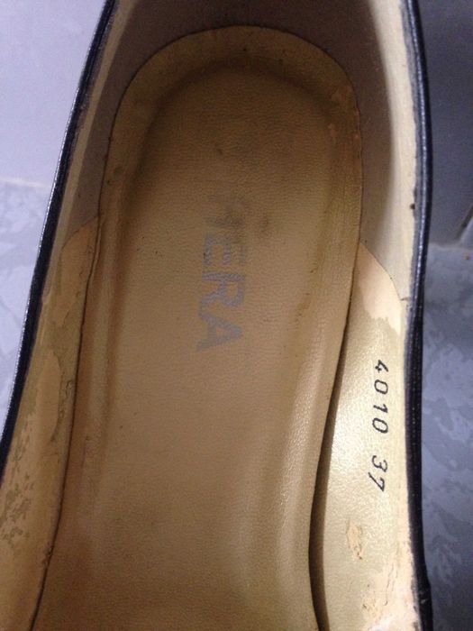 Sapatos em pele cor castanho