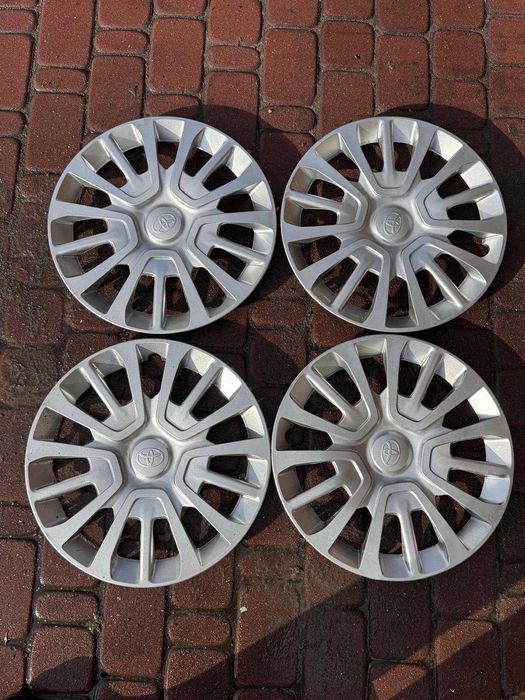 '16 Kołpaki komplet oryginalne Toyota Yaris Auris Aygo Avensis Proace