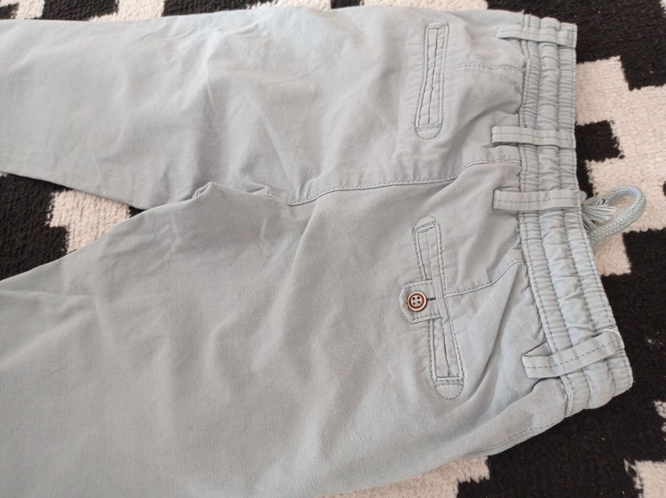 Spodnie bawełniane, eleganckie i wygodne. Reserved 110