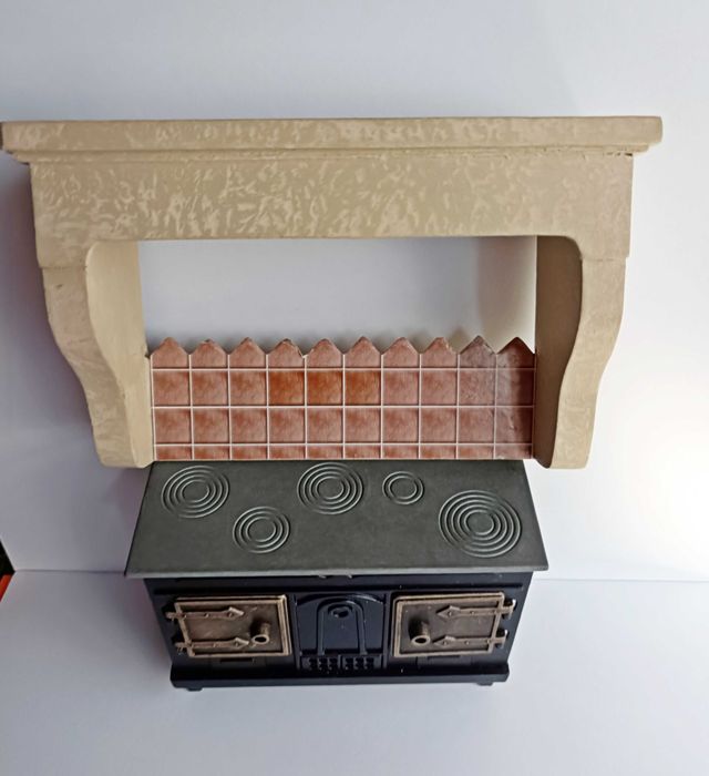 Conjunto de fogão a lenha em miniatura e chaminé