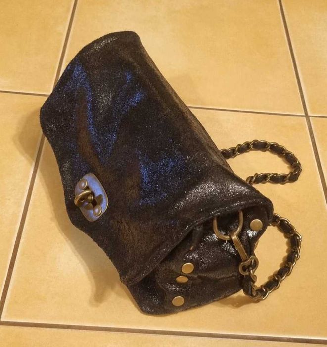 Mala preta em pele 1987 by Abaco