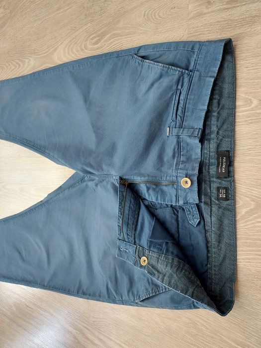 Pull&Bear spodnie eleganckie chinosy niebieskie idealne W38