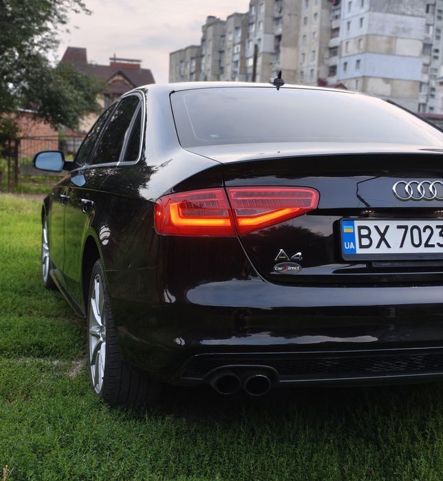 Audi A4 2014 VIN WAUAFAFL1FN026691 фото оголошення 2 з 8
