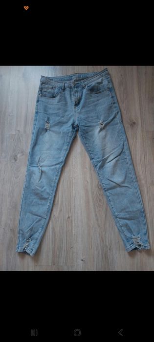 Spodnie slim z przetarciami rozm M