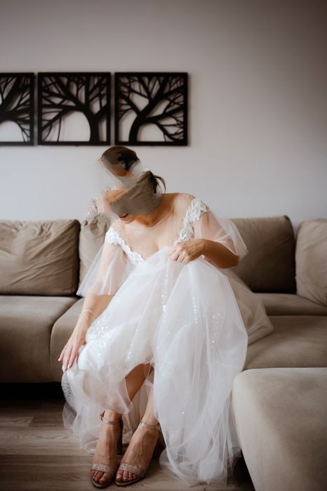 Suknia ślubna z odpinanymi rękawkami