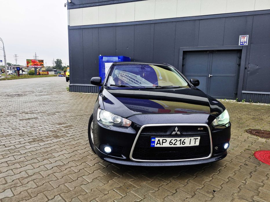 Митсубиши Лансер Х