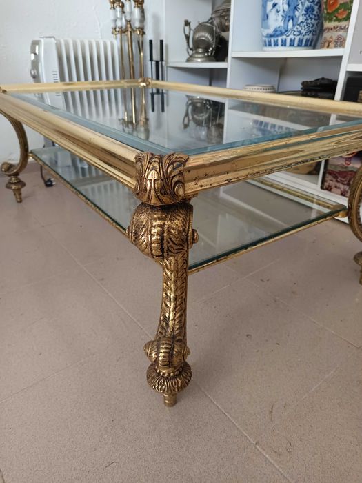 Selling a vintage glass and gold-painted iron coffee table