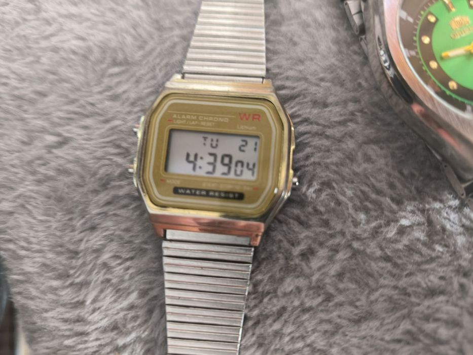3 zegarki orient Armani i jakis elektroniczny