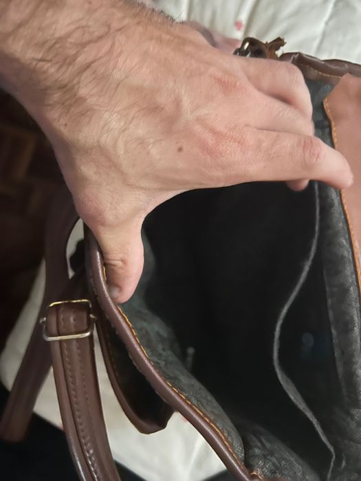 Mala de pele unisexo usada