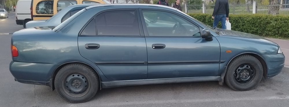 Продам автомобіль Mitsubishi Carisma 1.6 бензин АКПП