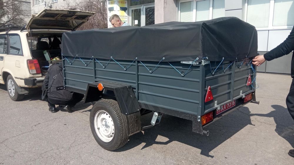 Причіп спеціалізований ПА 23 на ресорах Волга з двома бортами