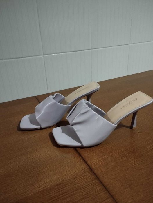 Botas e Sandálias de salto alto