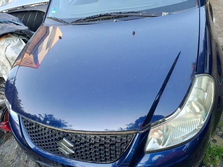 Maska Suzuki SX4 sedan sedici zjp